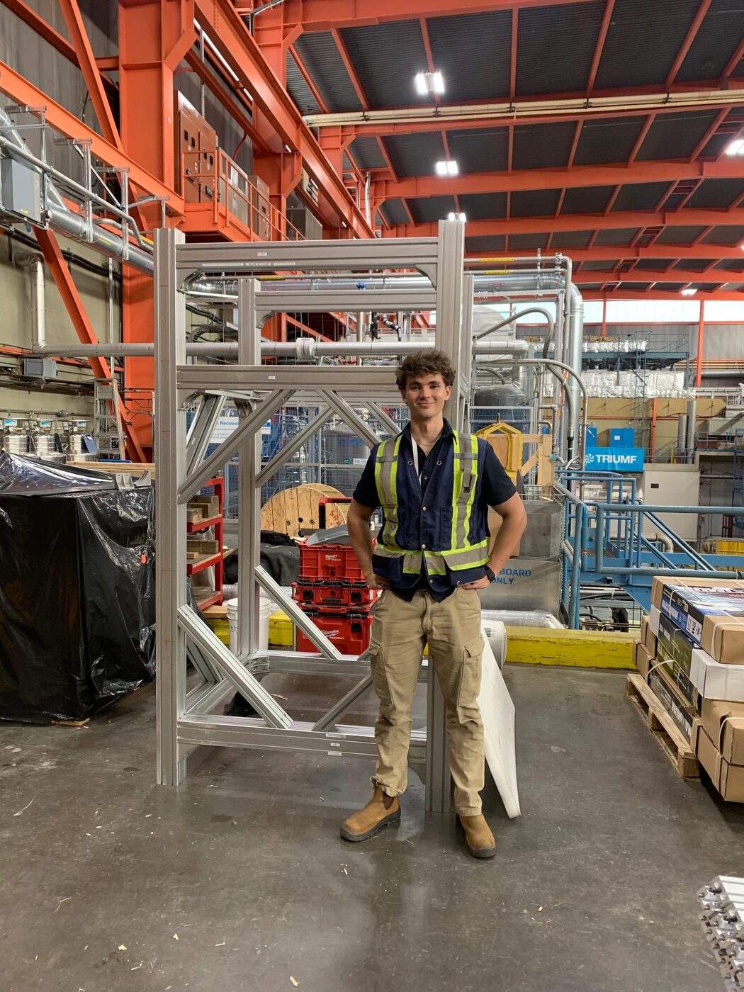 Working on a structural build in high-vis